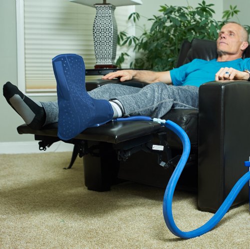 Active Ice 3.0 Foot and Ankle Cold Therapy system with blue 9 Quart Cooler by itself against a white background