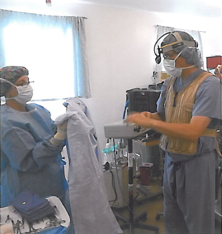 Surgeon wearing a CoolOR adjustable circulating cold water cooling vest