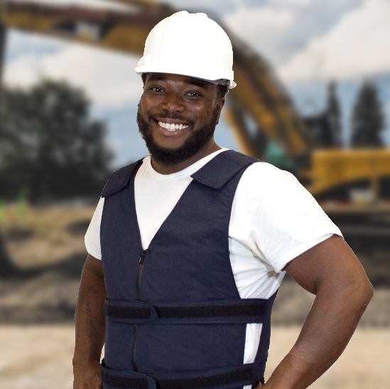 Man wearing nylon kool max adjustable zipper front cooling vest in front of construction equipment