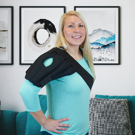 Woman wearing a Thera-temp moist heat shoulder wrap with elastic straps