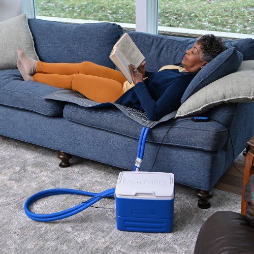 Active Ice 3.0 Blanket Cold Therapy system with blue 9 Quart Cooler by itself against a white background