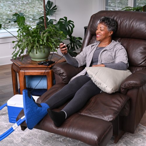 Active Ice 3.0 Foot and Ankle Cold Therapy system with blue 9 Quart Cooler by itself against a white background