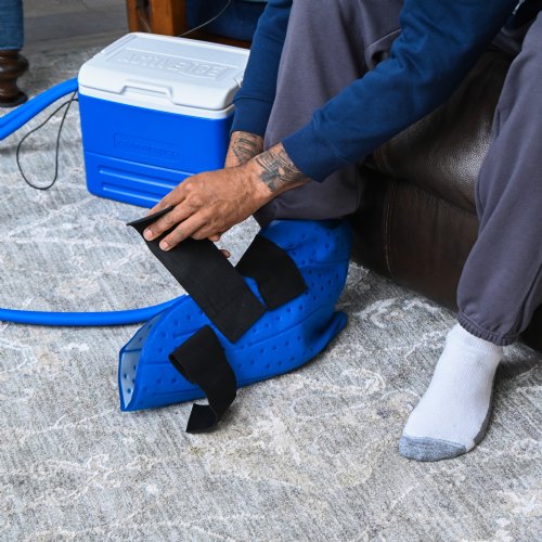 Active Ice 3.0 Foot and Ankle Cold Therapy system with blue 9 Quart Cooler by itself against a white background