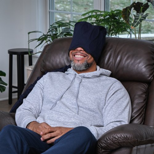 A Mannequin head is wearing an Active Ice3.0 Extended Circulating Cold Water Therapy Headcap in the background a 15 Quart reservoir is visible