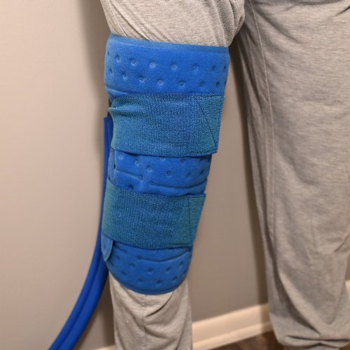 an active ice cold water therapy system full coverage knee displayed to show its contents 