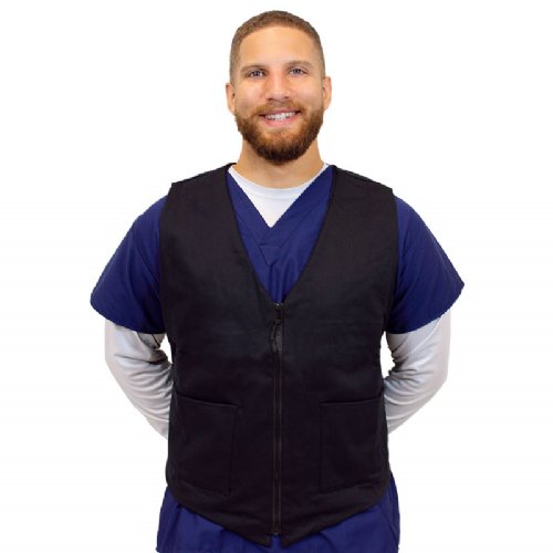 A man in scrubs wearing a black fashion vest is shown