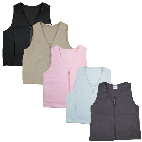 a woman wearing a khaki fashion vest two koolmax packs are shown next to her