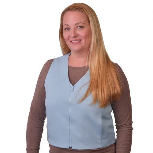 a woman wearing a khaki fashion vest two koolmax packs are shown next to her