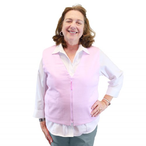 A woman wearing a light pink fashion vest