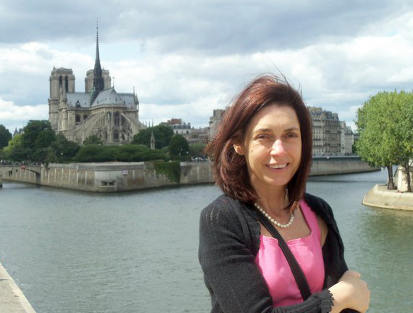 Woman next to a river in Paris