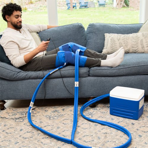 an active ice cold water therapy system full coverage knee displayed to show its contents 