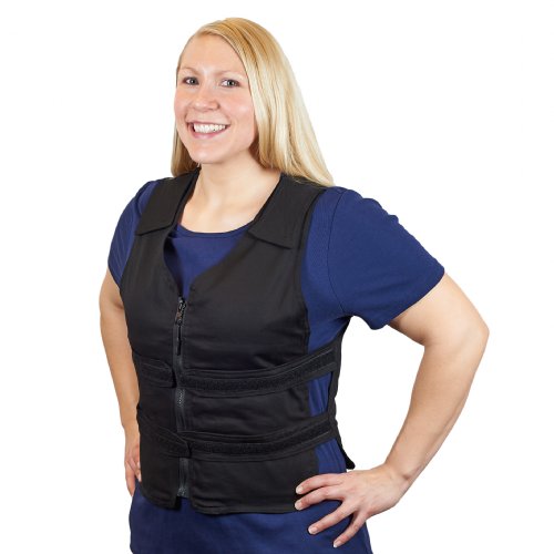 Woman smiling wearing a black adjustable cooling vest over a dark blue shirt 