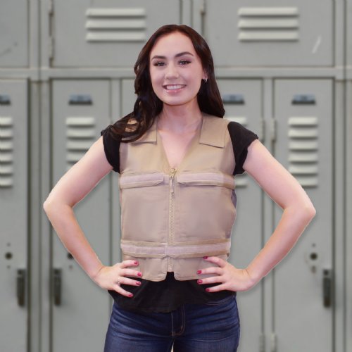 Young teen girl in Adjustable Cooling vest in Khaki standing against lockers 