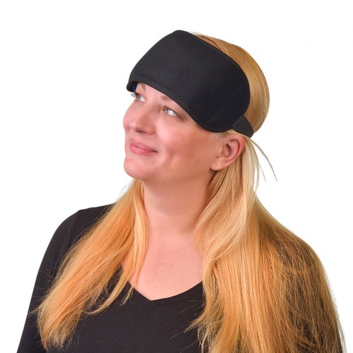 Woman wearing hot or cold gel ice pack compression wrap on migraine hotspots