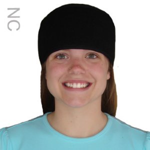 woman wearing headache therapy ice pack compression wrap on her eye and sinus area