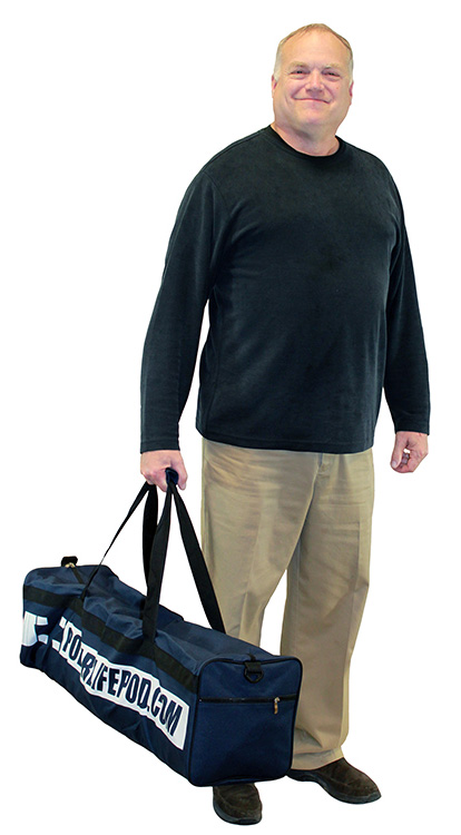 Man carrying a Polar Life Pod gym bag