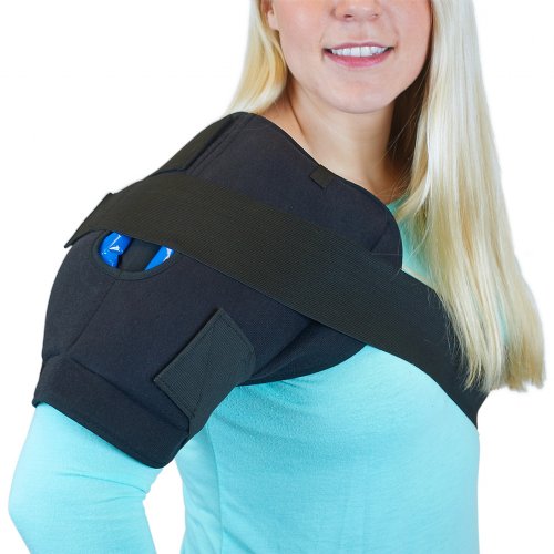 Woman wearing shoulder neck pain hot and cold ice compression wrap