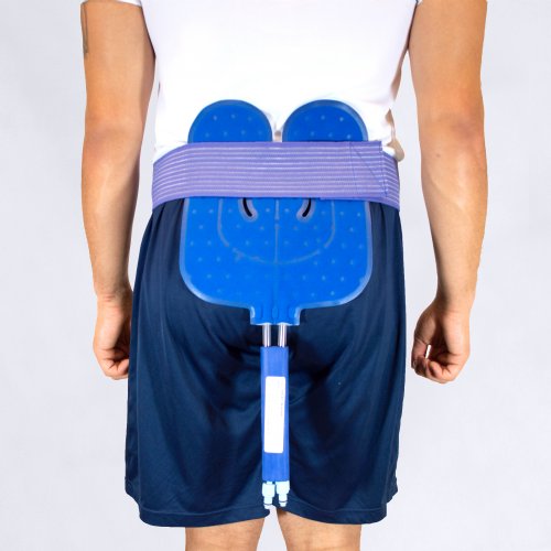 Athletic man wearing an ice cold therapy compression universal water pack on his back