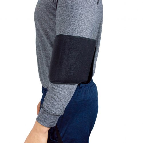 Atheletic man wearing hot and cold ice pack with elbow cold wrap