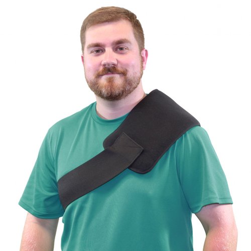 Man wearing shoulder neck pain hot and cold ice compression wrap