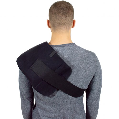 shoulder hot and cold gel ice compression therapy wrap worn on atheletic man