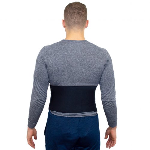 instant gel sports flexible hot and cold ice lumbar wrap worn on atheletic man 