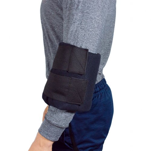 Atheletic man wearing hot and cold ice pack with elbow cold wrap