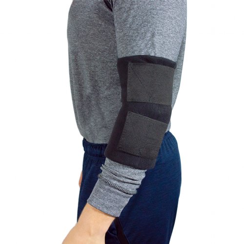 Atheletic man wearing hot and cold ice pack with elbow cold wrap